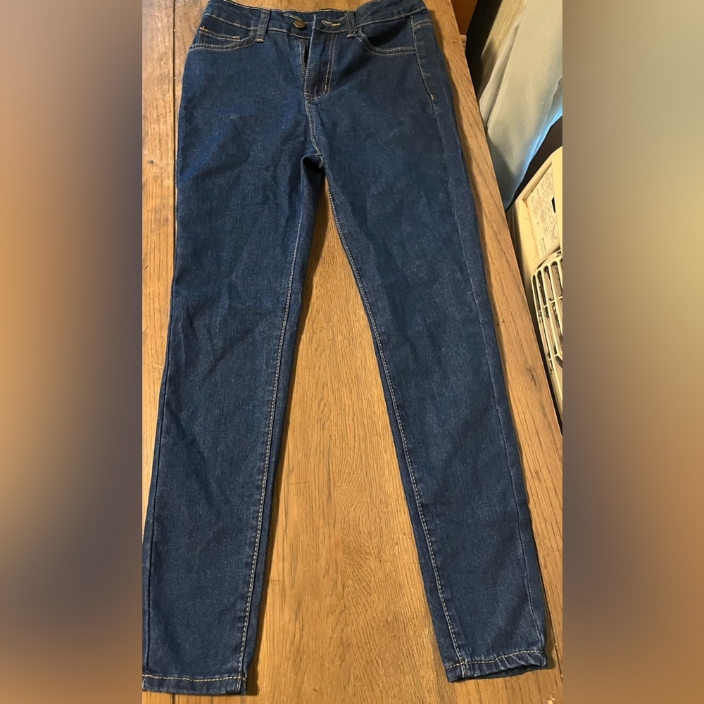 NWOT dark washed blue jeans